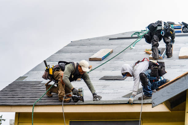 Professional Gutter Installation technician working in Paxton, MA